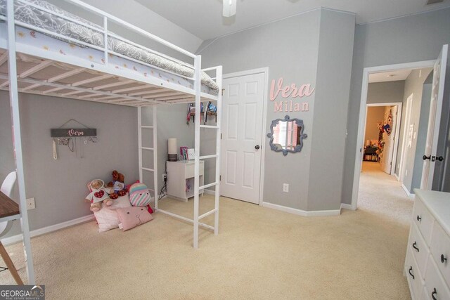 bedroom featuring light carpet, ceiling fan, visible vents, and baseboards