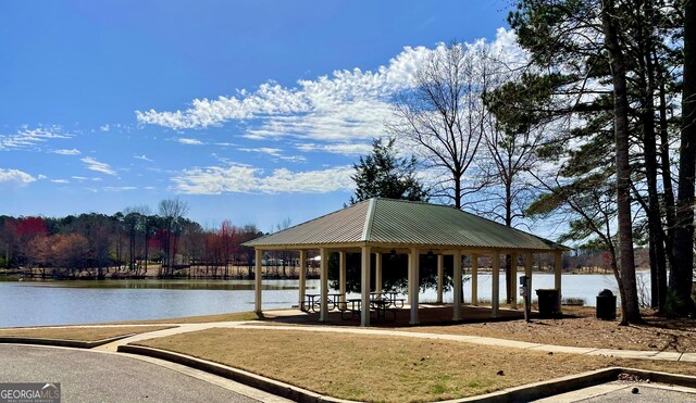 dock area featuring a water view and a gazebo