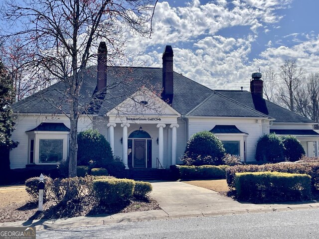 view of front of property featuring a chimney