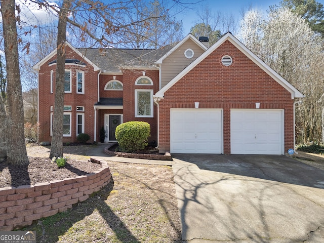 view of front of house with a garage, brick siding, and driveway