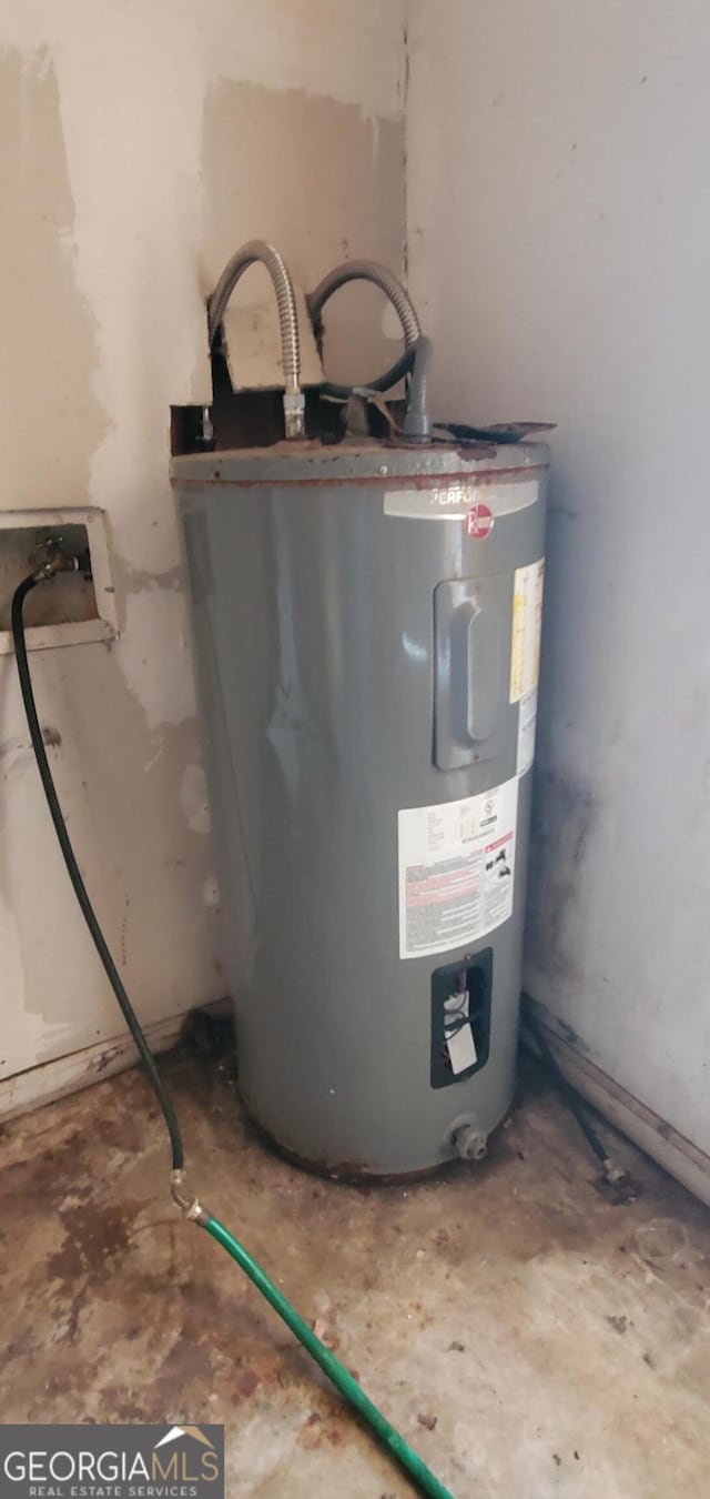 utility room with water heater