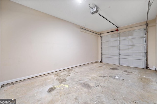 28 Eagle Glen Dr NE, Cartersville, GA 30121 - garage with baseboards and a garage door opener
