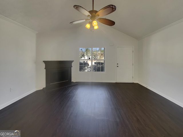 unfurnished living room featuring a fireplace with raised hearth, baseboards, vaulted ceiling, dark wood finished floors, and crown molding