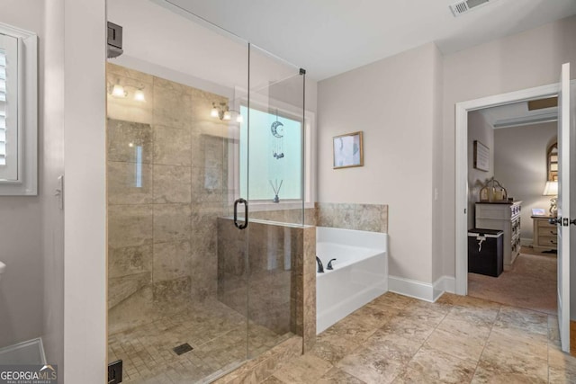 full bath featuring a shower stall, visible vents, baseboards, and a bath