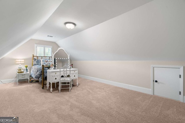 playroom with carpet floors, baseboards, visible vents, and vaulted ceiling