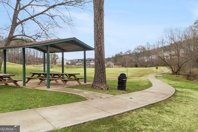 view of community featuring a lawn and a gazebo