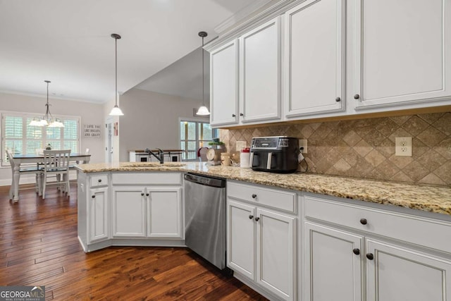 kitchen with dishwasher, a peninsula, decorative backsplash, and white cabinets