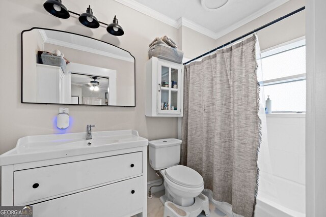 1015 Michigan Ave NW, Atlanta, GA 30314 - bathroom with ornamental molding, vanity, toilet, shower / tub combo with curtain, and a ceiling fan