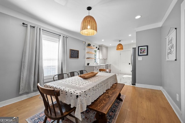 1015 Michigan Ave NW, Atlanta, GA 30314 - dining space featuring baseboards, light wood finished floors, and recessed lighting
