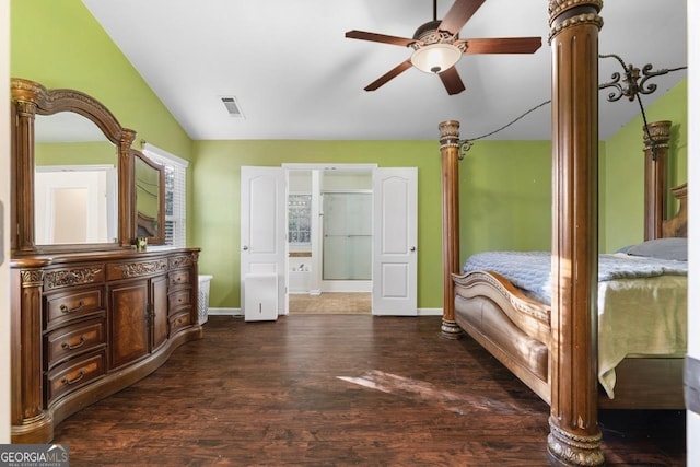 bedroom with baseboards, visible vents, a ceiling fan, dark wood-style flooring, and vaulted ceiling