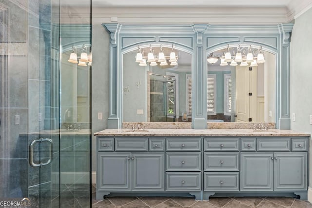 bathroom with a stall shower, a sink, and double vanity