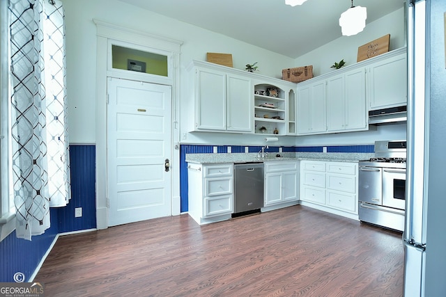 kitchen with appliances with stainless steel finishes, dark wood-style flooring, under cabinet range hood, and open shelves