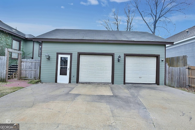 garage with fence