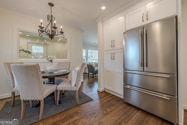 dining area with recessed lighting, baseboards, dark wood-type flooring, and ornamental molding