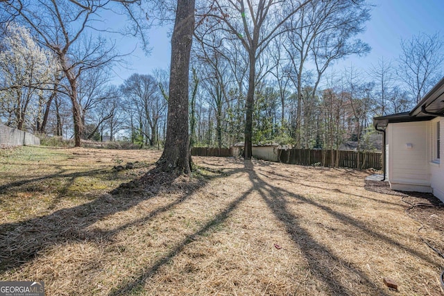 view of yard with fence