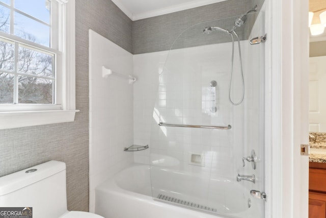 bathroom featuring crown molding, vanity, toilet, and shower / bathtub combination