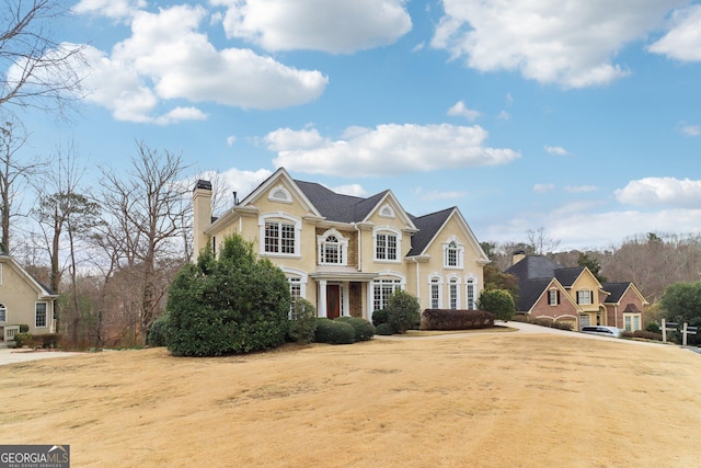 view of front of property with a chimney