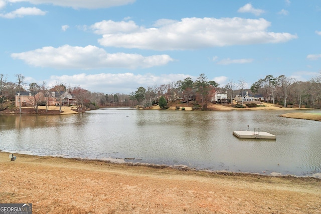 view of water feature with a dock