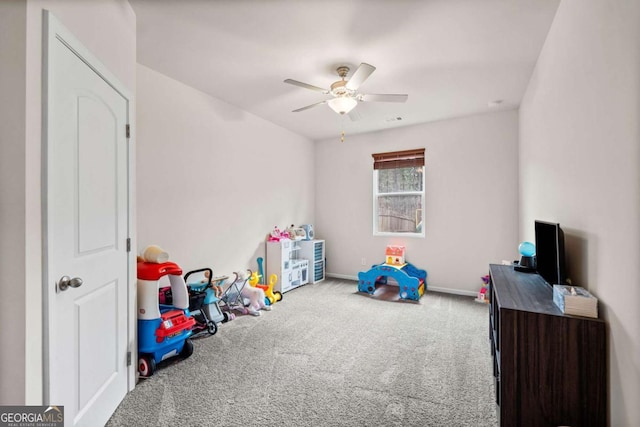 game room featuring a ceiling fan, carpet, and baseboards