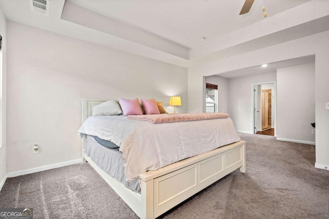 bedroom with baseboards, visible vents, ceiling fan, and carpet flooring