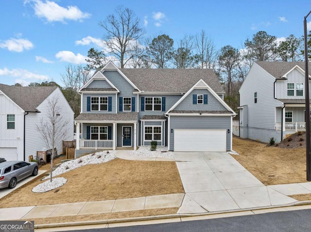 view of front of property featuring an attached garage, covered porch, a shingled roof, concrete driveway, and a front yard