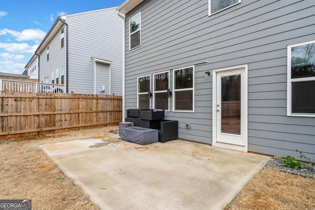 view of patio with fence