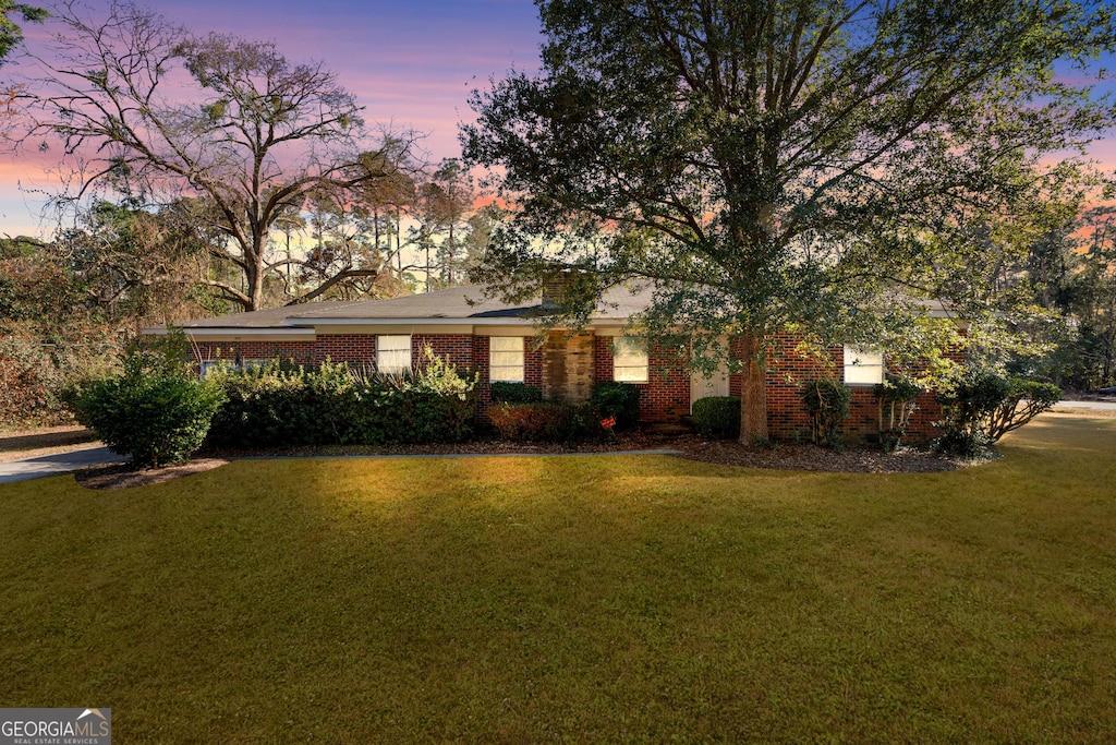 202 S Edgewood Dr, Statesboro, GA 30458 - view of front of home featuring brick siding and a front yard