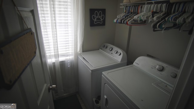 laundry area featuring laundry area and washer and dryer