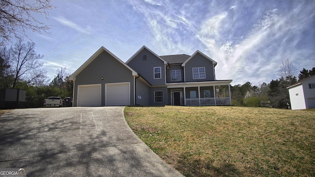 view of front of home featuring a garage, a porch, a front lawn, and concrete driveway