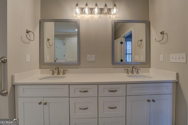 full bath with double vanity and a sink