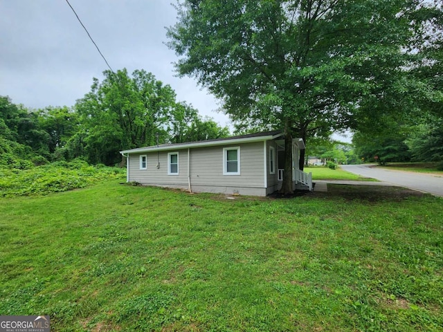 exterior space with a front lawn