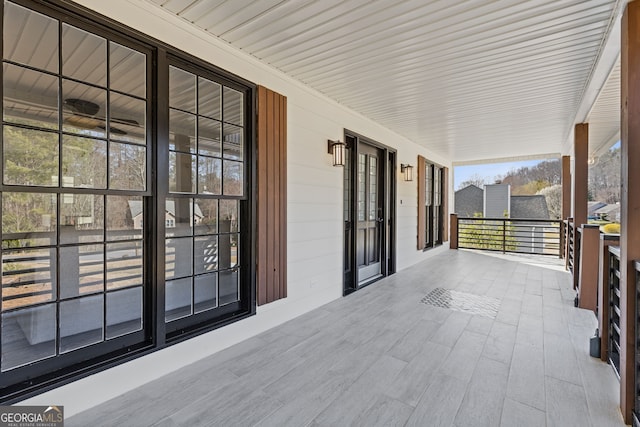 view of patio featuring a porch