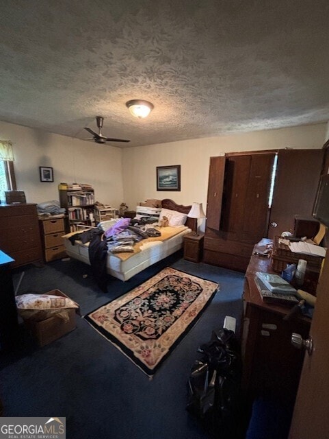 carpeted bedroom with a textured ceiling