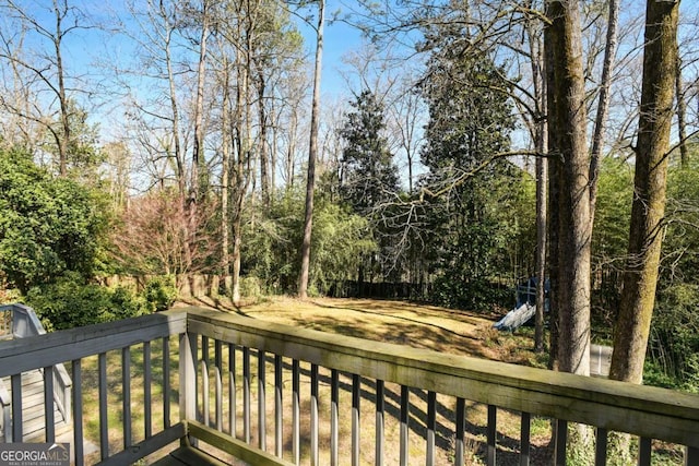 wooden deck featuring fence