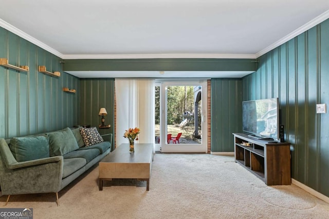 carpeted living room with ornamental molding