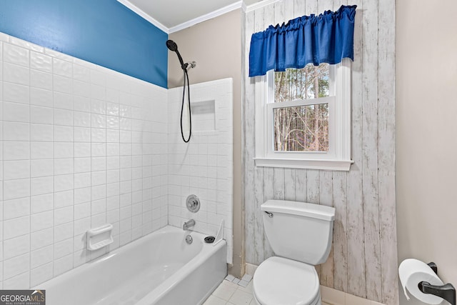 full bath with shower / bathtub combination, tile patterned flooring, toilet, baseboards, and ornamental molding