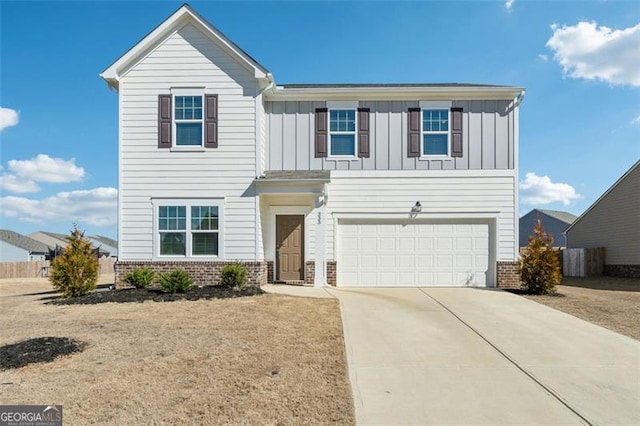 view of front of property with a garage, driveway, brick siding, and board and batten siding