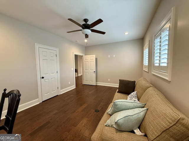 living area featuring dark wood-style flooring, recessed lighting, a ceiling fan, and baseboards