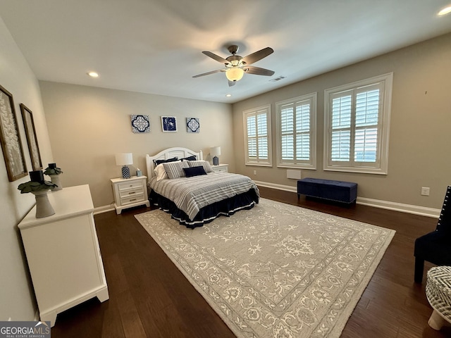 bedroom featuring dark wood-type flooring, recessed lighting, visible vents, and baseboards