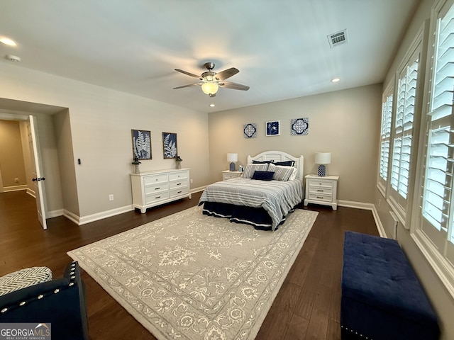 bedroom with recessed lighting, visible vents, dark wood-type flooring, a ceiling fan, and baseboards