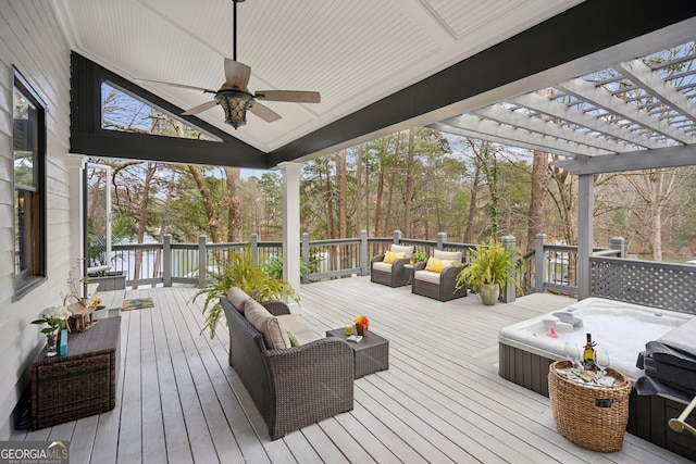 wooden terrace featuring a pergola, outdoor lounge area, and a ceiling fan