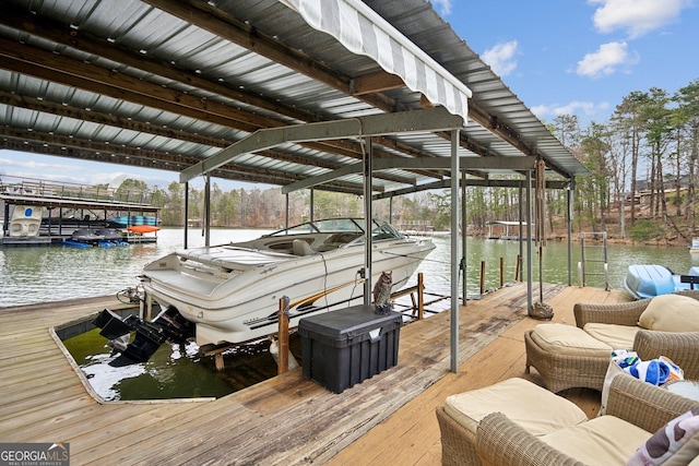 dock area featuring a water view and boat lift