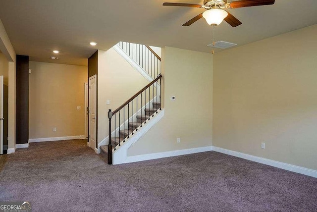 carpeted empty room with recessed lighting, baseboards, and stairs