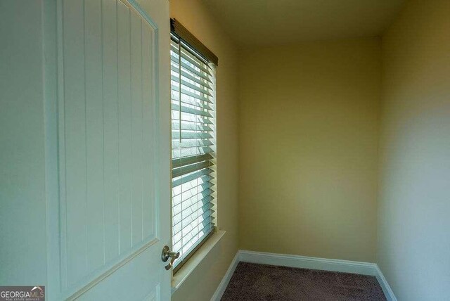 interior space with baseboards