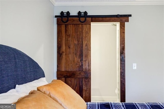 interior space featuring crown molding and baseboards