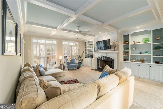 living area with light carpet, a fireplace, coffered ceiling, and beamed ceiling