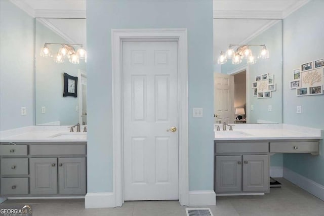 full bathroom with two vanities, a sink, and ensuite bath