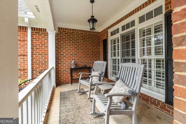 balcony featuring a porch