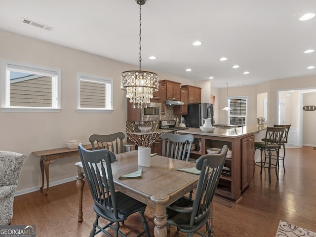 608 Larch Looper Dr, Griffin, GA 30223 - dining area with recessed lighting, visible vents, wood-type flooring, and baseboards