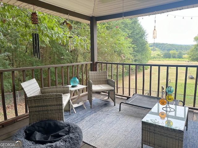 746 Thomas Rd, Trion, GA 30753 - unfurnished room featuring a ceiling fan, wood finished floors, ornamental molding, and baseboards
